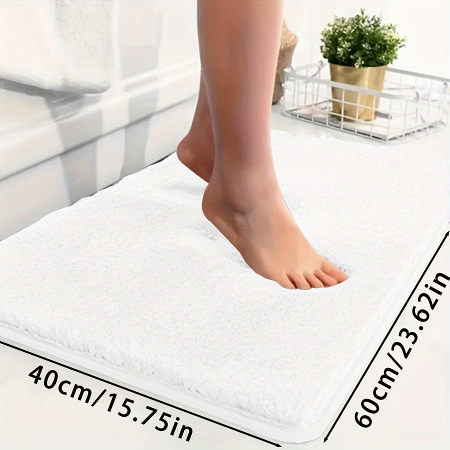 Ultra-soft bathtub mat with non-slip backing, absorbent and fade-resistant. Perfect for bathroom, laundry room, or entranceway.