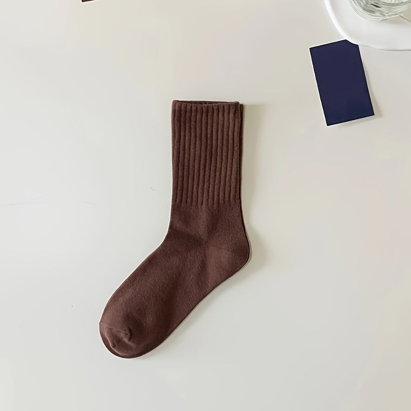 5 pairs unisex plain color crew socks, versatile and breathable for casual or sports wear.