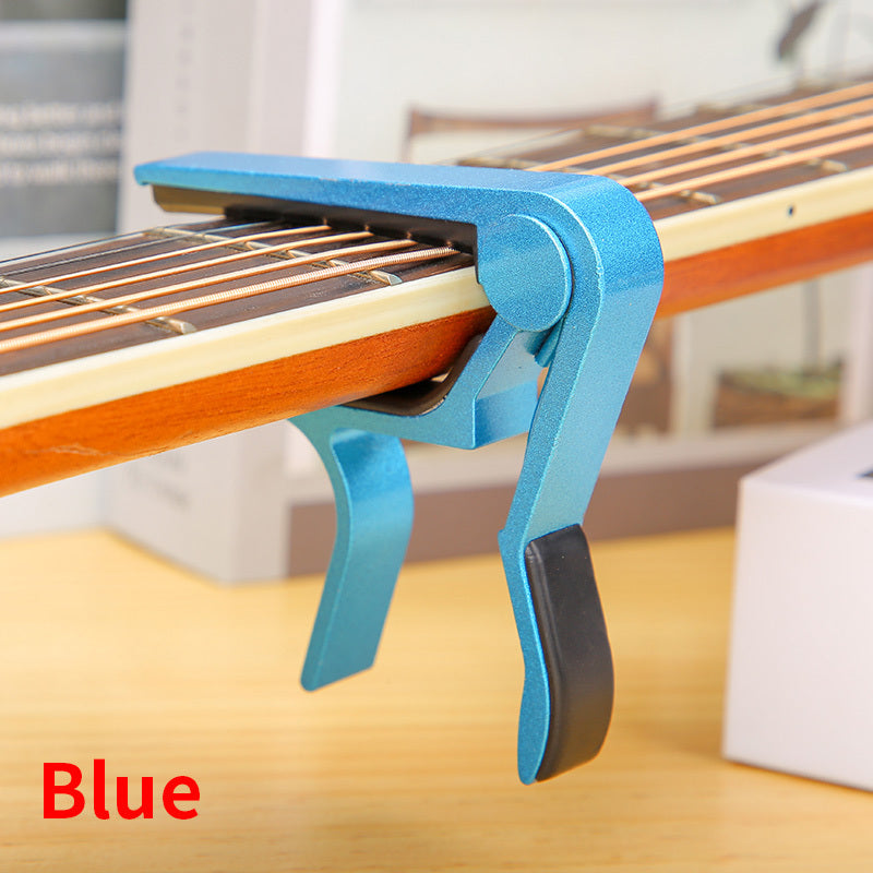 Aluminum alloy guitar capo for acoustic, classical, electric guitars and ukuleles, quick change with tone adjustment.