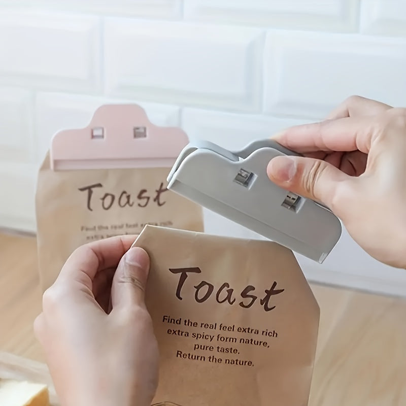 Food Bag Sealing Clips available in 6pcs or 12pcs, perfect for sealing in freshness and keeping moisture out. These large snack clips are a must-have household gadget for your kitchen.