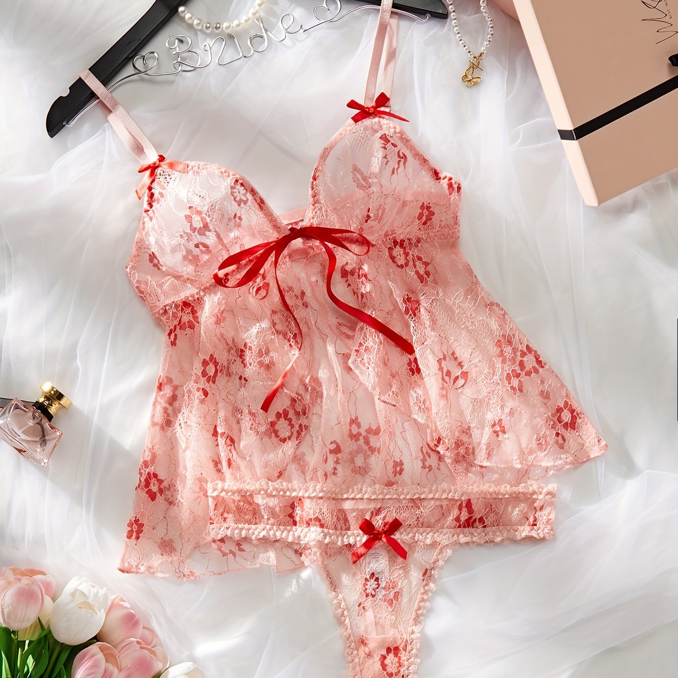 Bow tie floral lace lingerie set including a semi-sheer bra and panties for women's sexy underwear.