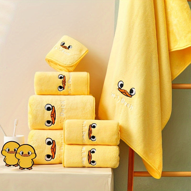 Yellow Duck Pattern Towel Set of 3: Soft, absorbent towels for bath and face, includes bath, hand, and square towels; ideal for bathroom use.