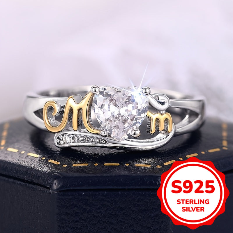 Heart-shaped zirconia ring in sterling silver with MOM lettering, featuring a 4-prong setting in a vintage sexy style. Perfect for all seasons, this ring makes a great Mother's Day gift. It also includes a synthetic gemstone representing April's