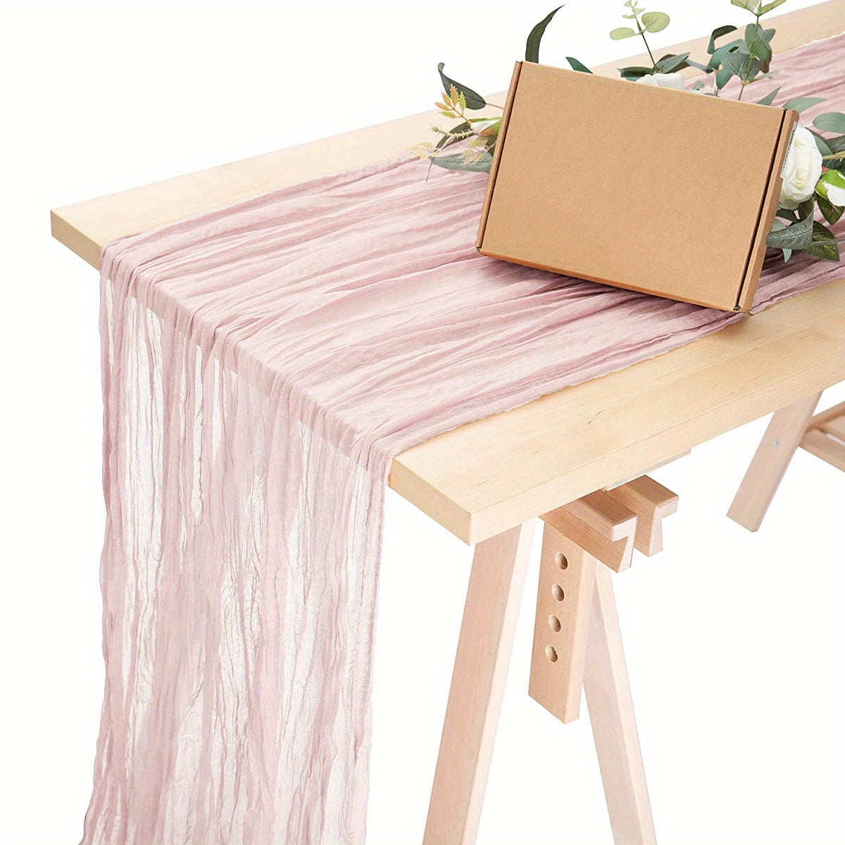 Polyester crinkle table runner for rustic wedding decor.