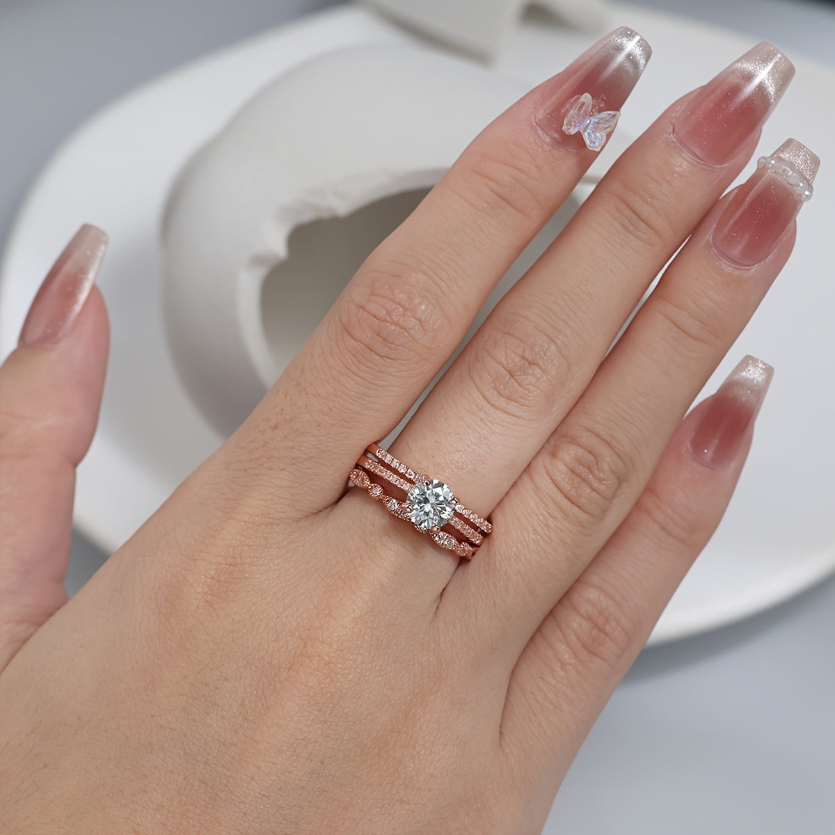 Pick one of these high-quality 925 sterling silver stacking rings with inlaid 1ct, 2ct, or 3ct moissanite for your engagement or wedding. Choose between silvery or rose golden options, each comes with a certificate and gift box.