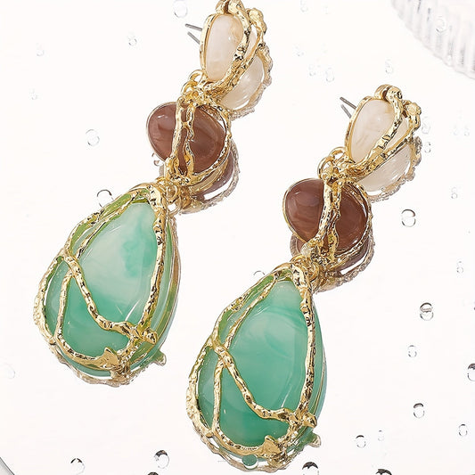 Vintage boho style resin stone earrings with drop and dangle design for women. These geometric lightweight earrings feature luxury ear hooks without plating. Perfect for daily wear and gifting occasions, suitable for all seasons. Comes as a pair.