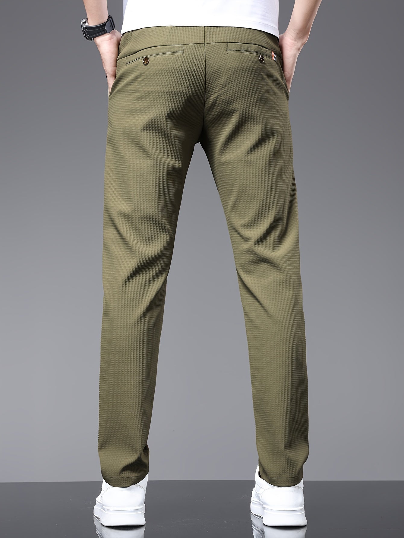 Men's slim fit pants with pockets, perfect for outdoor activities in spring and autumn.