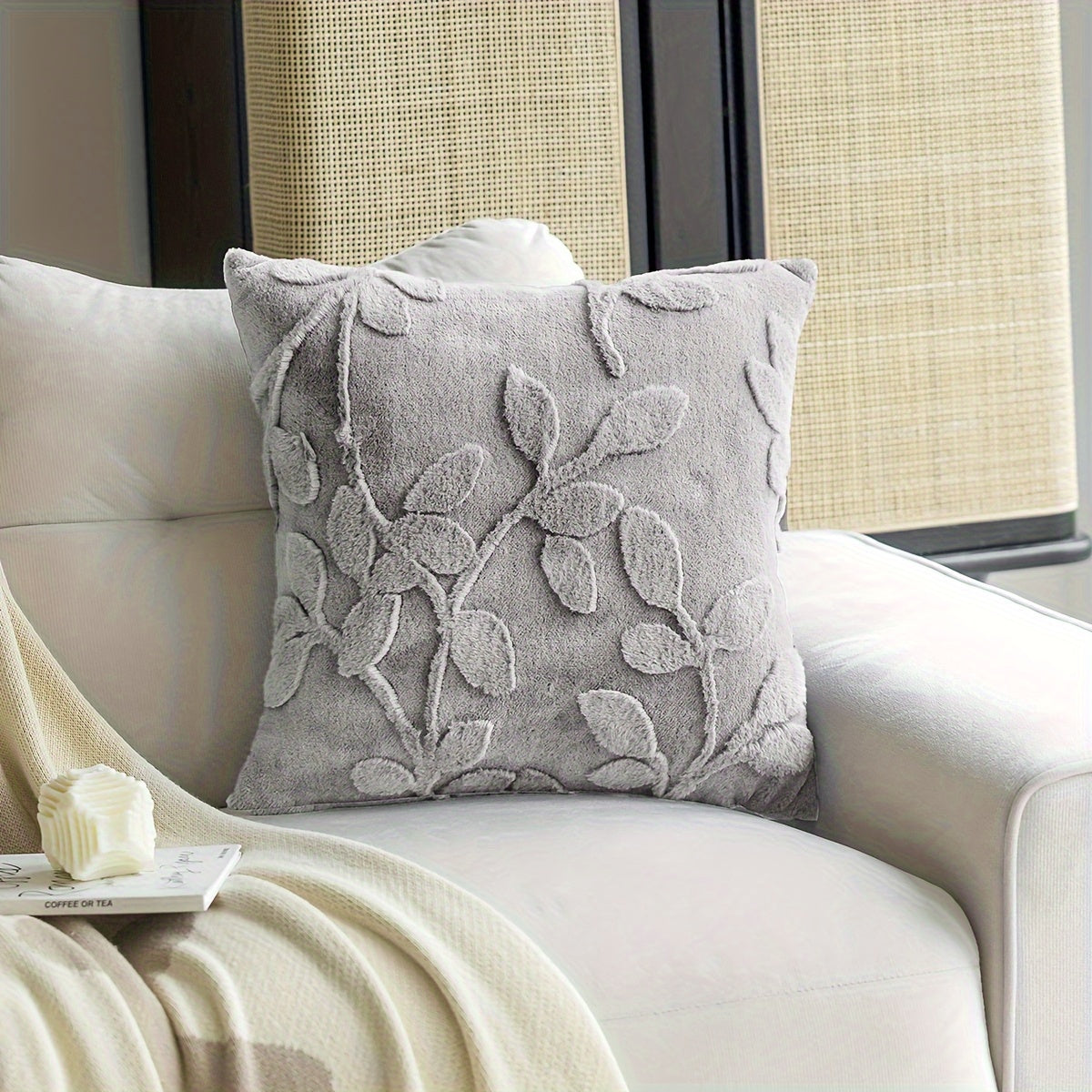 Soft faux rabbit fur throw pillow cover with branch pattern. This zippered cover is hand washable and perfect for adding a luxurious touch to your living room or bedroom decor.