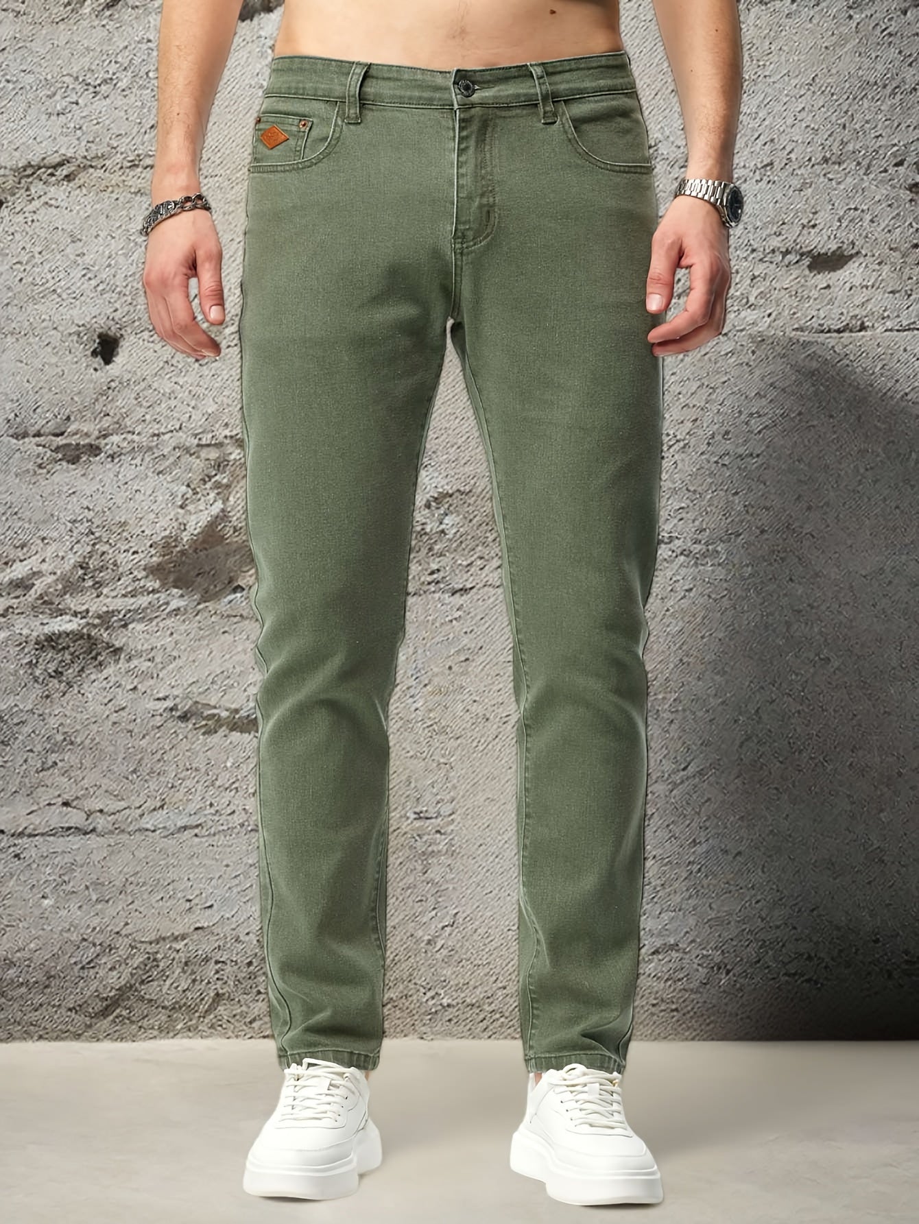 Stretchy denim jeans for men, ideal for casual outdoor wear.