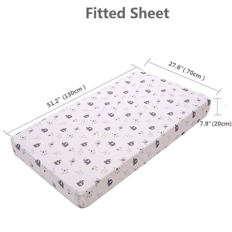 Set of 4 elegant polyester bedding items with baby cartoon animal print design for crib, including quilt, fitted sheet, crib skirt, and pillowcase.