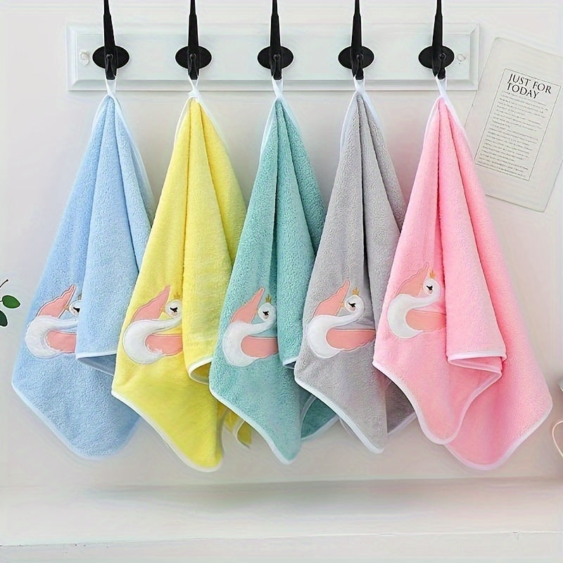 A 75*35cm Cartoon Swan Kid's Bath Towel with premium softness, absorbency, and quick-drying capability, ideal for use in the bathroom or at home.