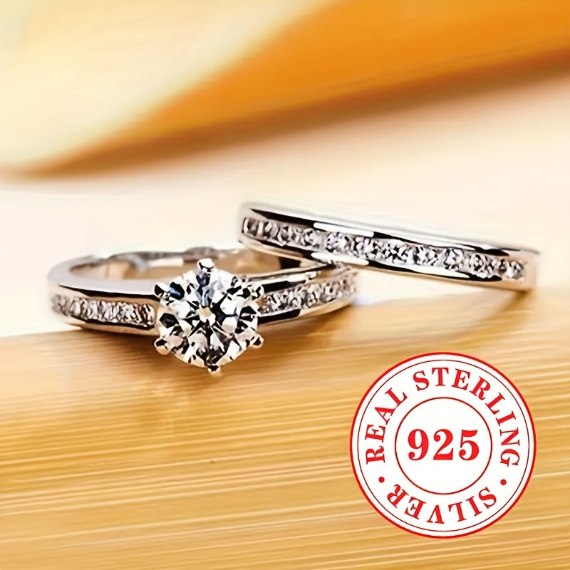 Two elegant sets of sterling silver rings, weighing 5.7g each. These luxurious rings feature a 6-prong set synthetic zirconia stone, perfect for engagement and wedding bands for women. The rings are designed with the April birthstone in a round cut