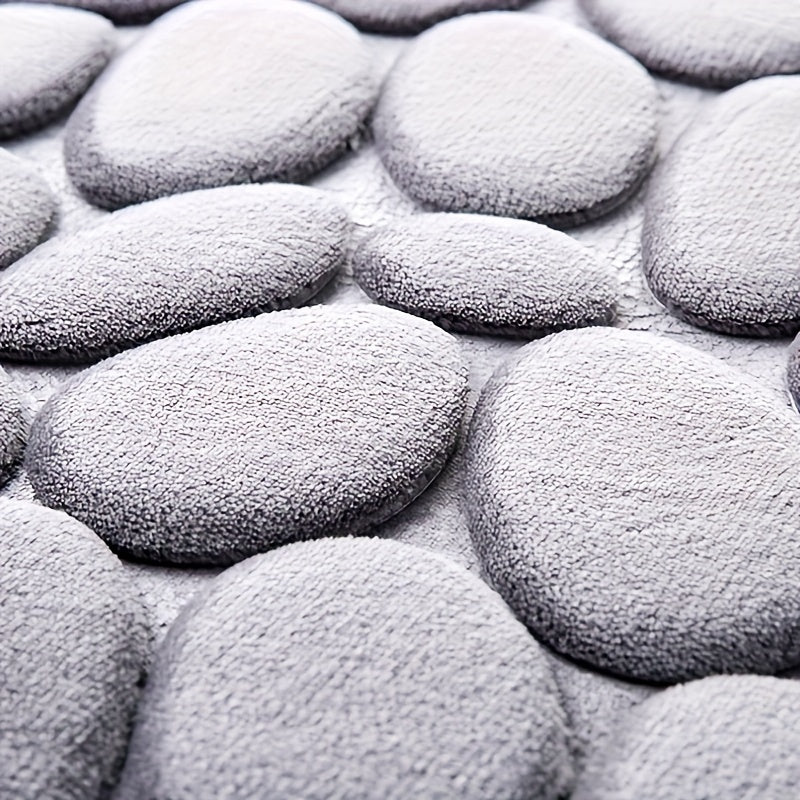 Pamper Your Feet with our Luxurious 3D Pebble Design Bath Rug! This Quick-Dry Non-Slip Bathroom Mat is made of Soft and Comfortable Polyester Memory Foam. It is Woven with a density of 700gsm and is 1.5cm Thick. Perfect for Home Decor and as Holiday