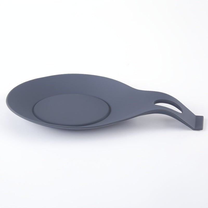 Silicone spoon rest for kitchen utensils - Easy to clean, heat-resistant holder for spoons and seasonings.