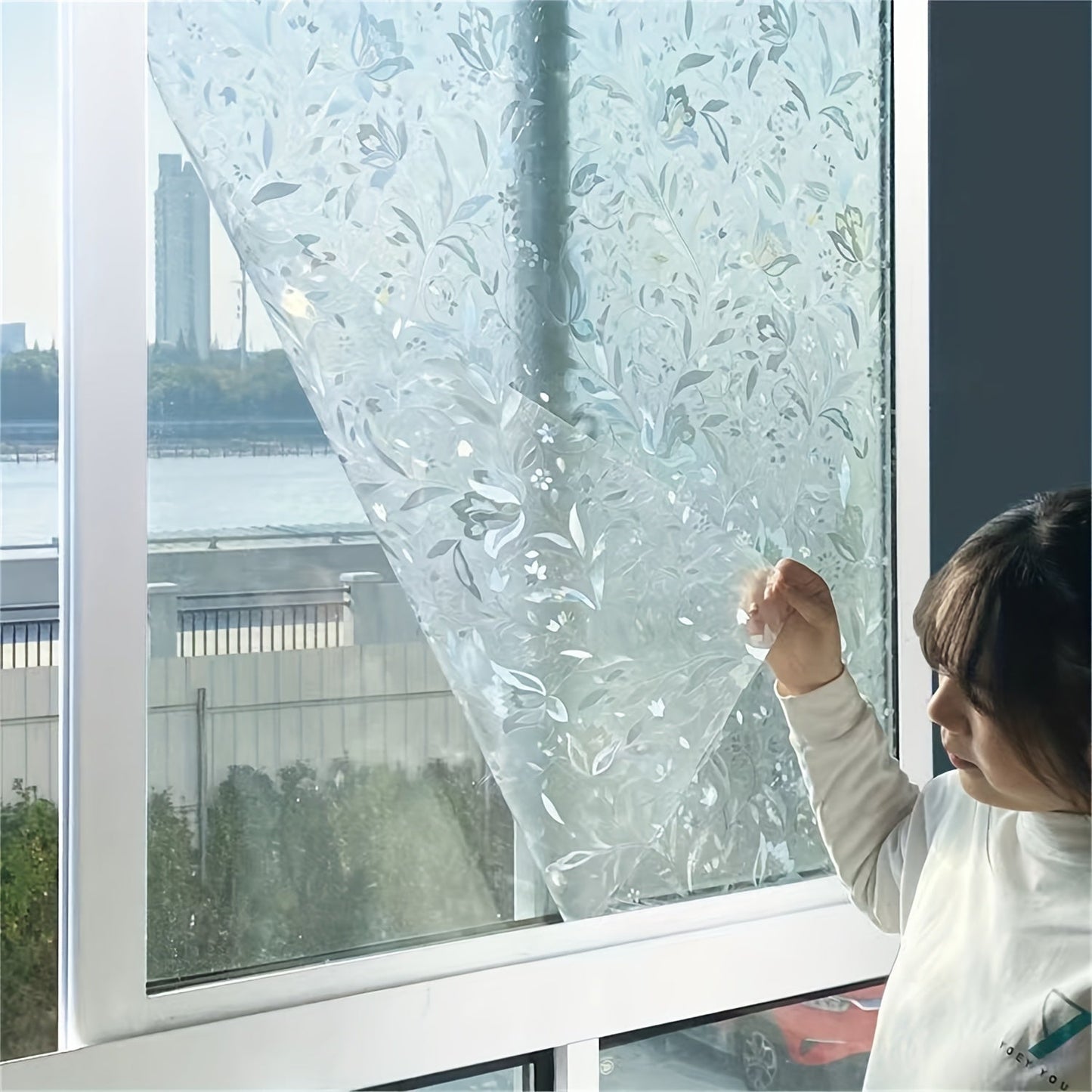 One roll of Tulip Privacy Glass Film, static cling window film ideal for enhancing privacy and decorating both office and home spaces.