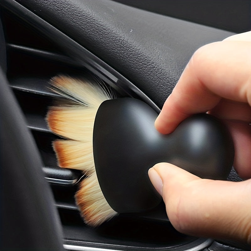 Soft brush for cleaning car interior, air conditioner, air outlets, and crevices - ultimate dust removal tool.