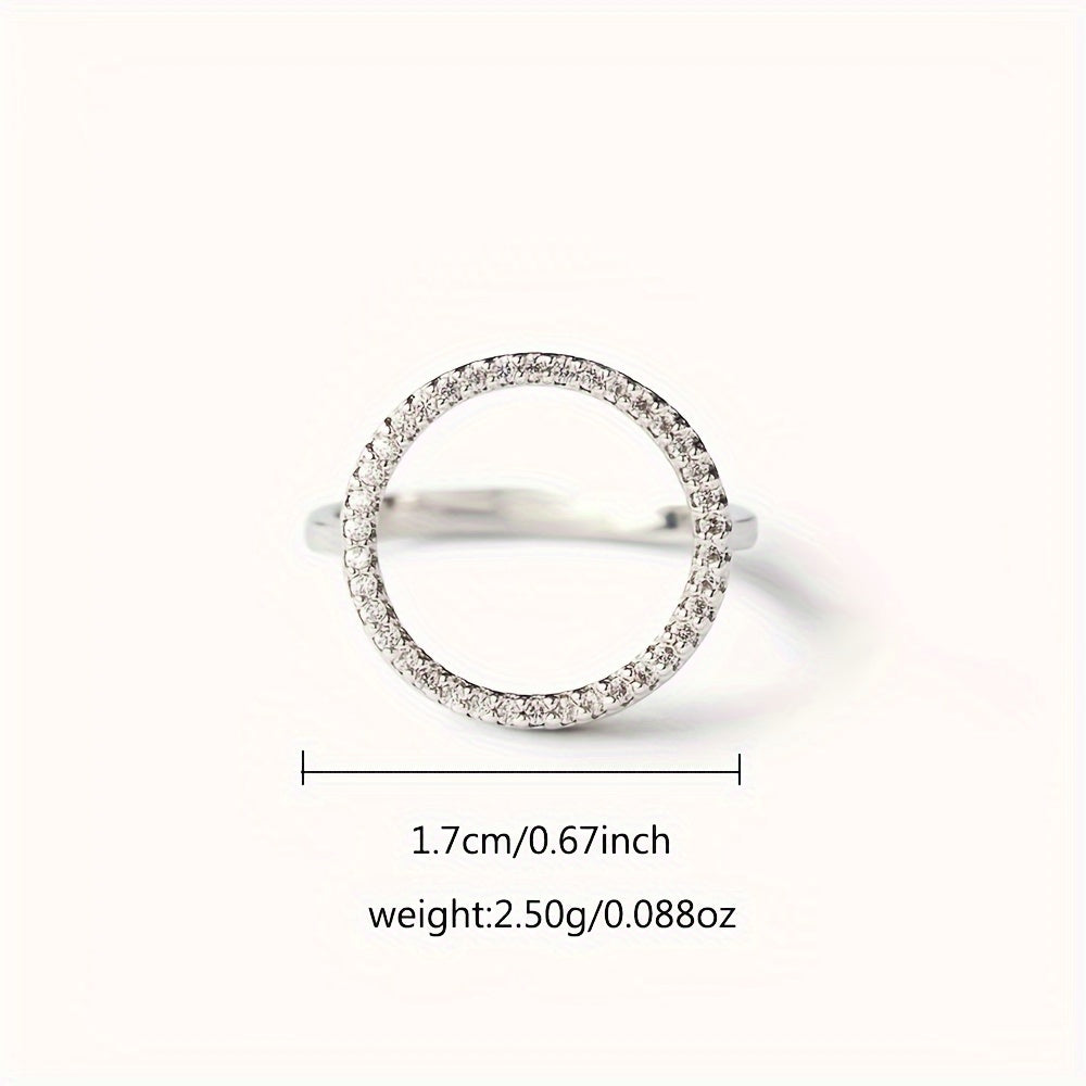 High quality jewelry featuring a sparkling circle design paved with shining zirconia stones, this 925 sterling silver ring is plated with 14k gold. Choose from golden, silvery, or rose golden tones to suit your preference.