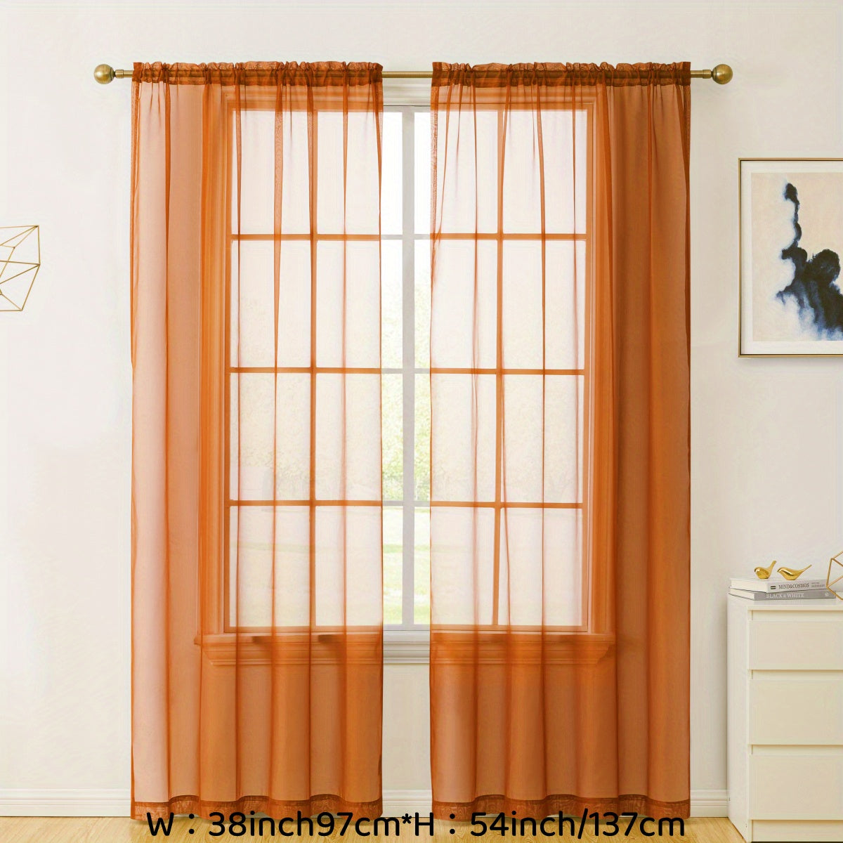 Enhance your decor with these elegant sheer voile curtain panels. Made of semi-transparent polyester, they feature a rod pocket design for easy hanging in your kitchen, bedroom, or living room. Create a romantic ambiance with these beautiful curtains.