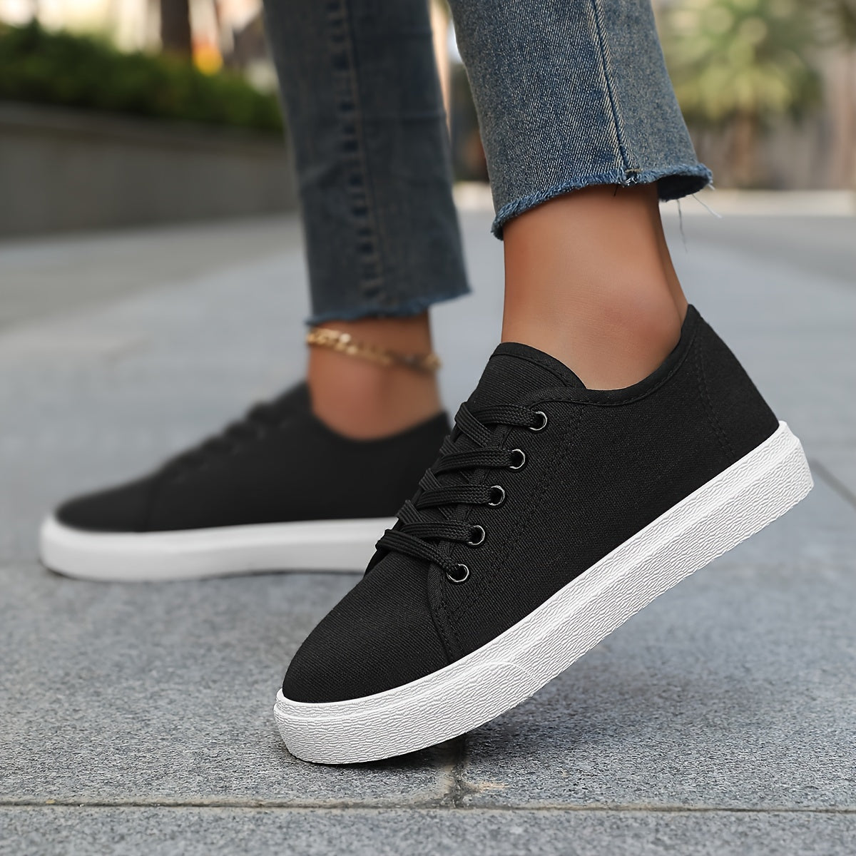 Preppy low top lace-up sneakers with solid color, breathable fabric upper, PVC sole, suitable for all seasons.