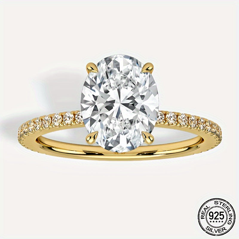 Elegant Oval Moissanite Engagement Ring featuring a 3ct Center Stone and 0.29ct Accents. Crafted in 925 Sterling Silver with 18K Golden Plating, this synthetic April Birthstone is suitable for both daily wear and weddings. Comes with a Certificate and