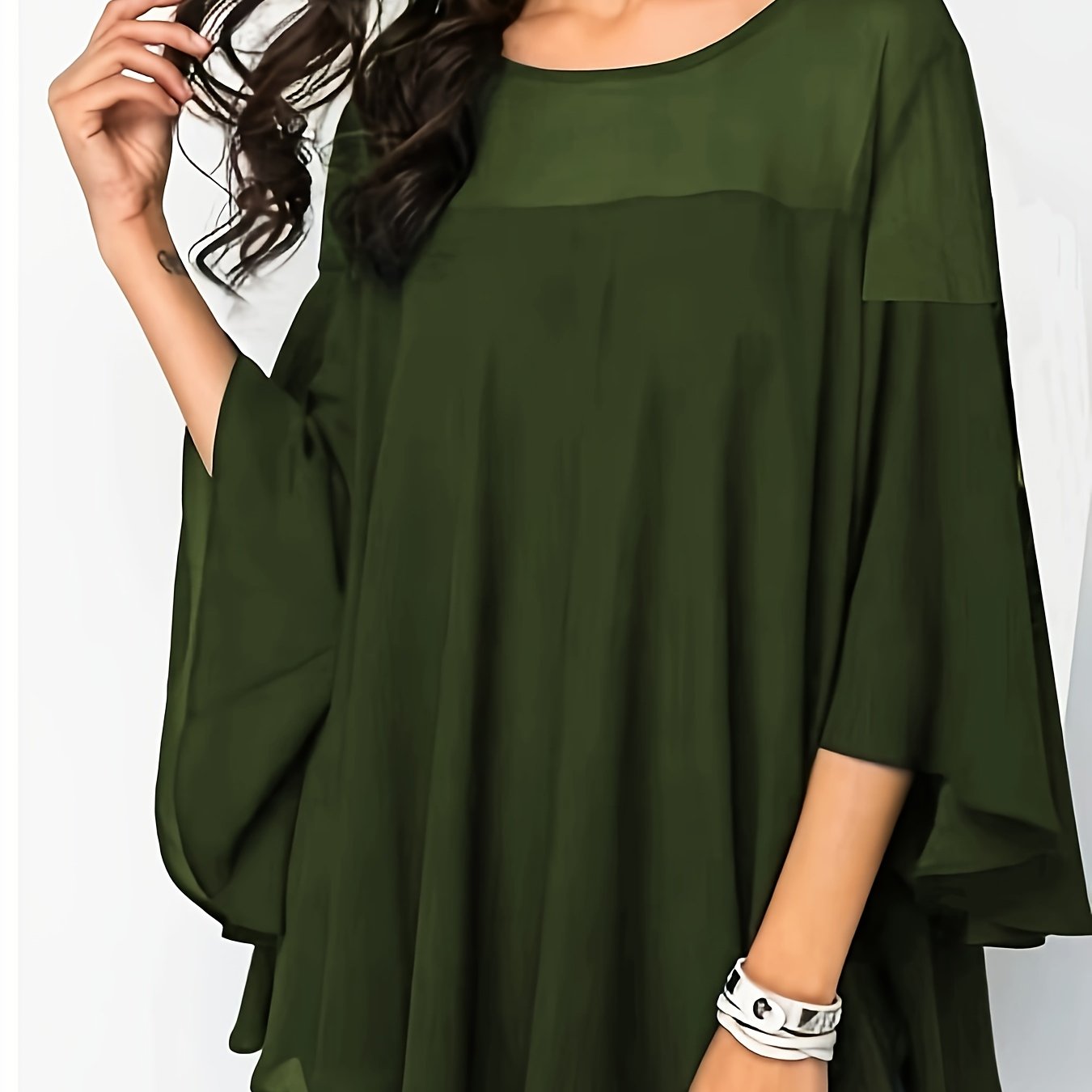 Women's plus size green blouse with elegant lace detail, half sleeves, round neck, and non-stretch polyester. Machine washable.