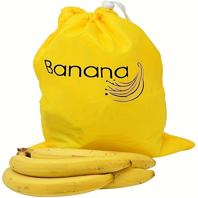 Reusable banana storage bag with drawstring, made of food-grade nylon and aluminum. Large capacity and double stitched to prevent ripening. Ideal for storing fruits and vegetables in the refrigerator. Perfect for lettuce and other vegetables.