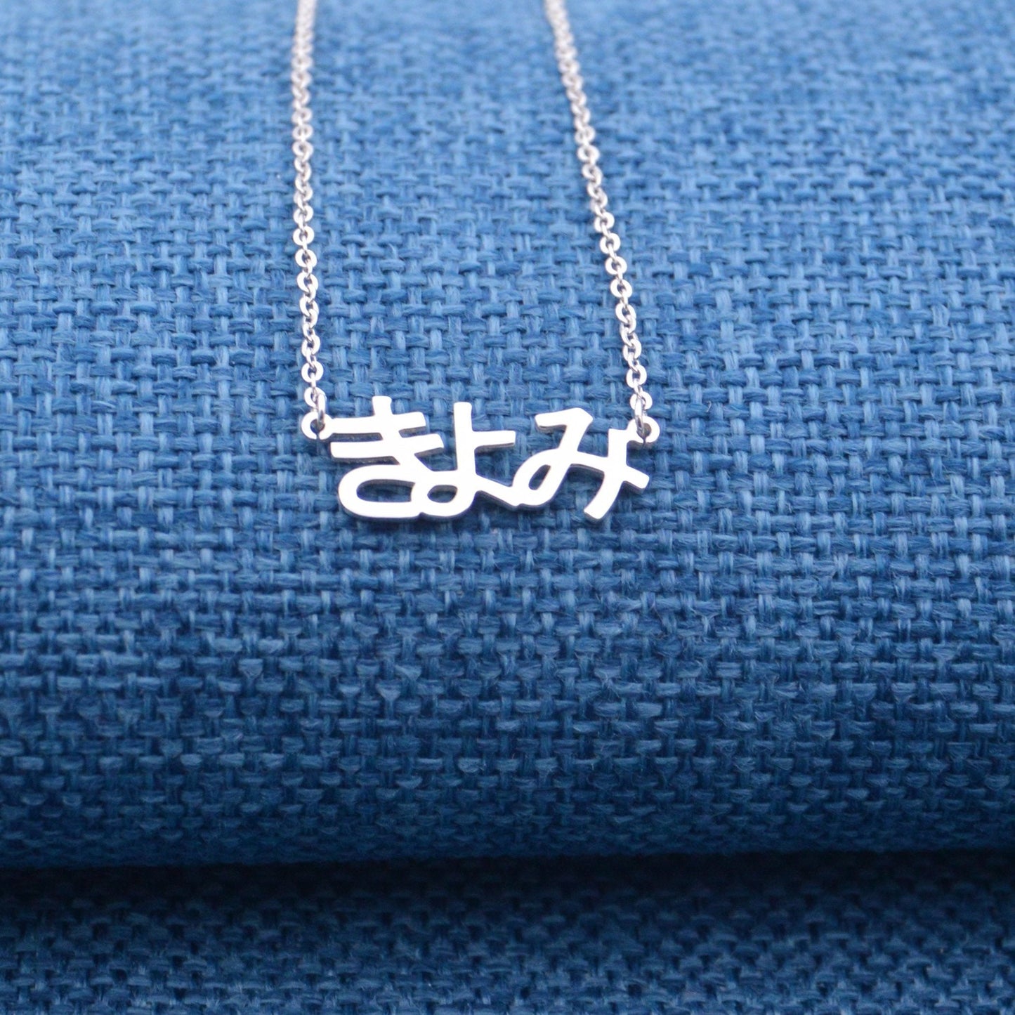 Handmade personalized stainless steel necklace with custom Japanese name in Hiragana, perfect for gifting to women