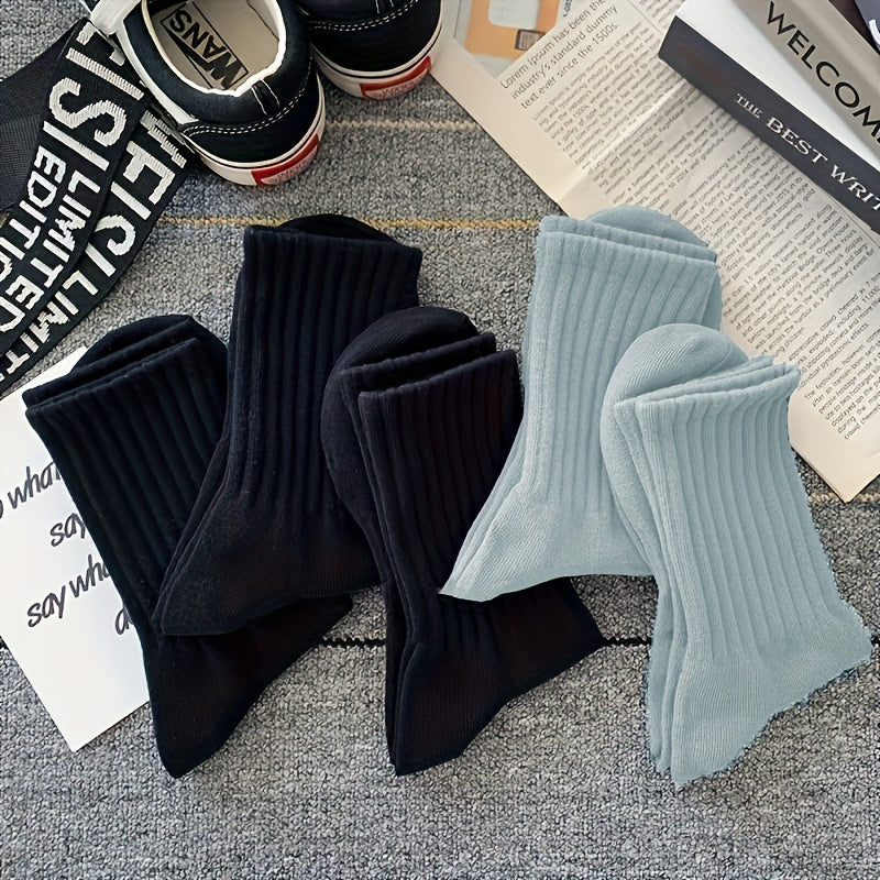 5-Pack of unisex crew socks made with breathable polyester/spandex blend in solid colors that won't fade. Features high waist and sports style, machine washable.