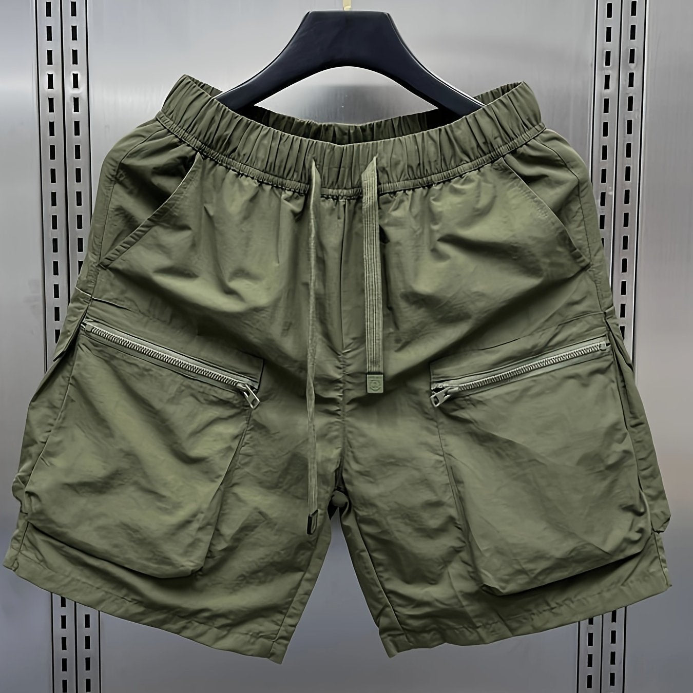 Japanese retro cargo shorts for men, loose fit, mid waist, with multiple pockets. Made of 100% polyamide, non-stretch, lightweight at 160g/m², ideal for hiking and outdoor activities.