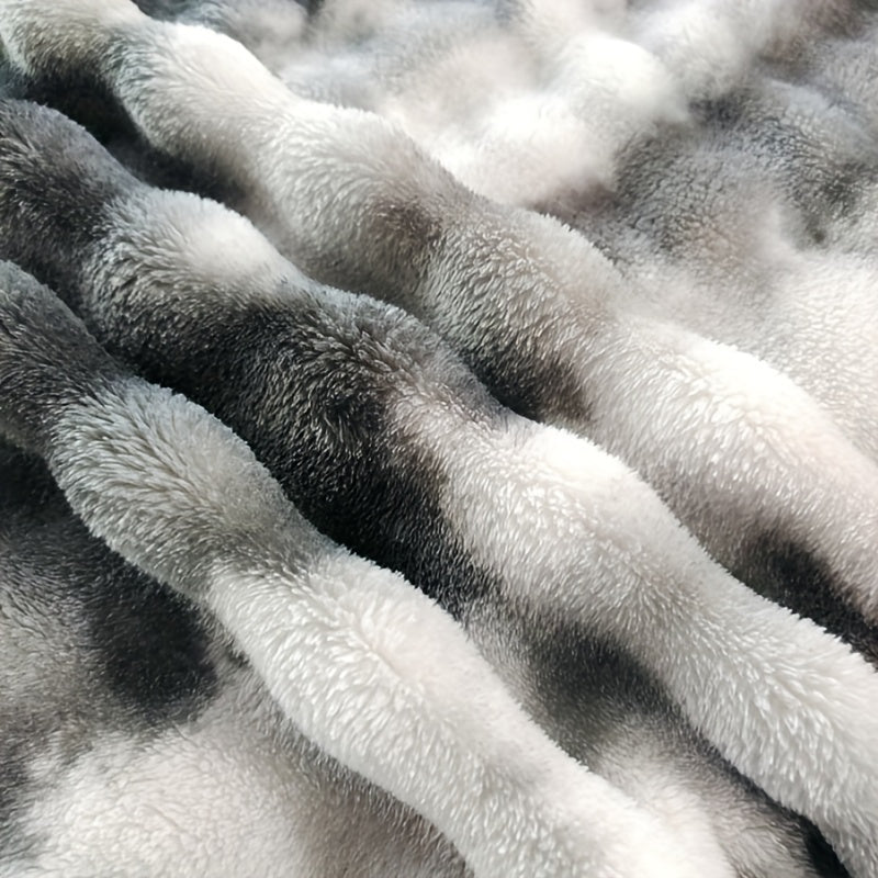 Soft and plush faux fur throw blanket for ultimate luxury and comfort. Perfect for cozying up on the couch or adding a touch of elegance to your bedroom or living room. Machine washable for easy care, suitable for all seasons. Measures 99.06x149.86cm.