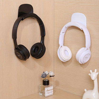 Stylish plastic hooks with curved design for easy mounting and versatile use for headphones, bags, hats, scarves, and more.