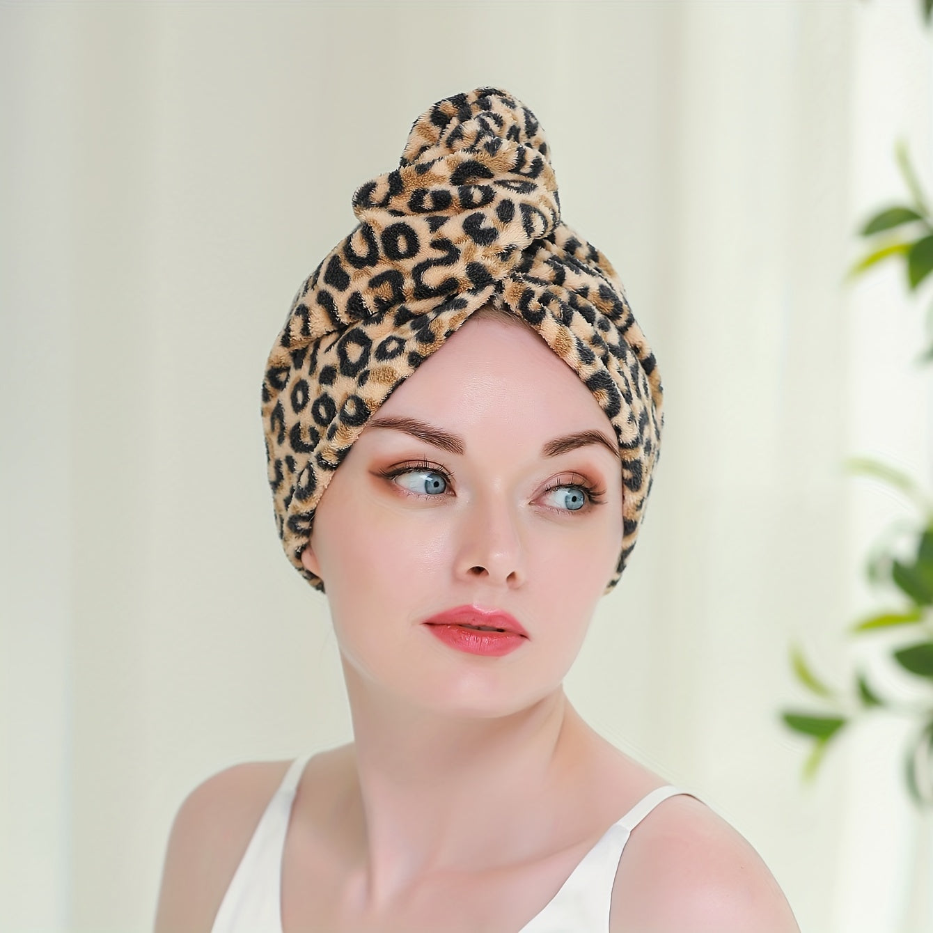 Leopard printed hair drying cap for women, absorbent and quick-drying, perfect for bathroom use.