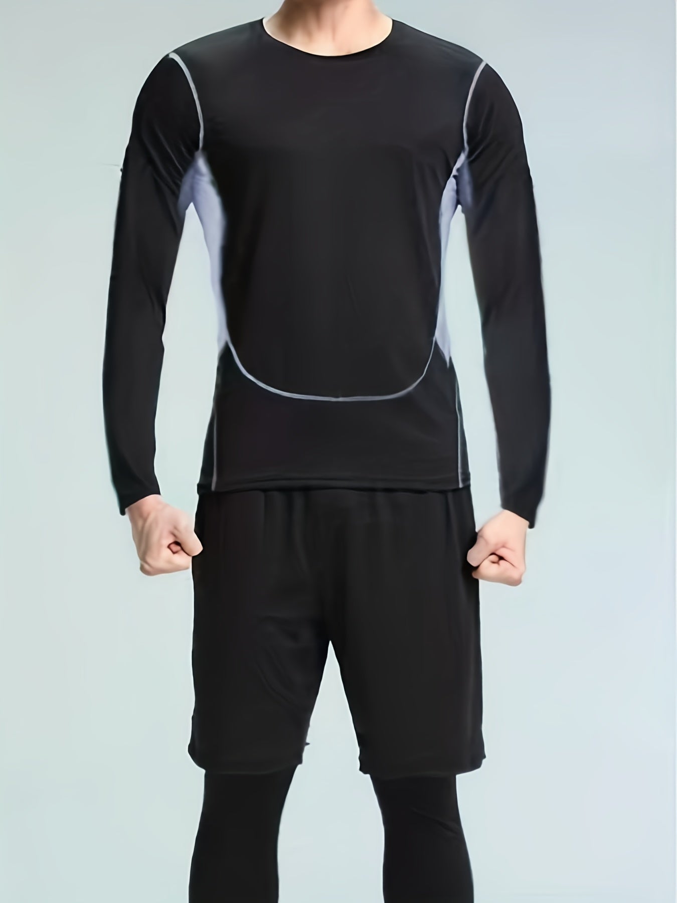 Men's tight sportswear set for gym workouts and running, featuring breathable long sleeve shirts and indoor workout pants.