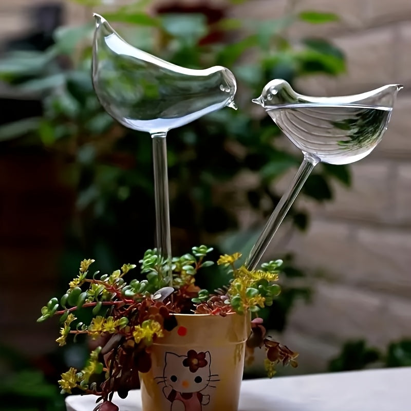 5 bird-shaped self-watering globes for indoor and outdoor plants.