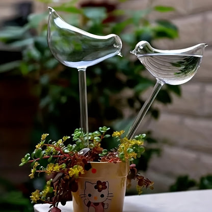 5 bird-shaped self-watering globes for indoor and outdoor plants.