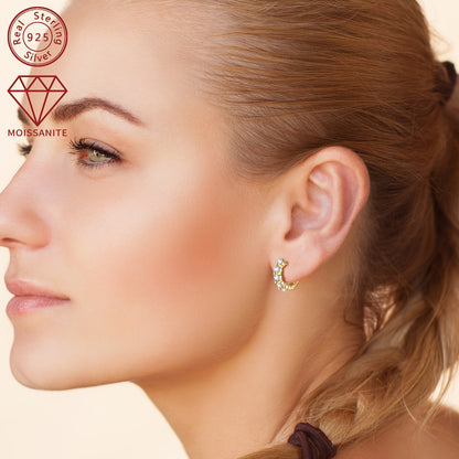 These women's fashion earrings feature a classic daily style, crafted with 925 silver and set with 10 pieces of 3.5mm moissanite stones, each weighing 1.0ct. The total weight of the earrings is 3.39g. These round synthetic moissanite earrings are a