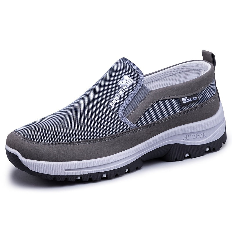 Men's slip-on sports sneakers with breathable fabric upper, round toe, and faux sole for daily wear and running.