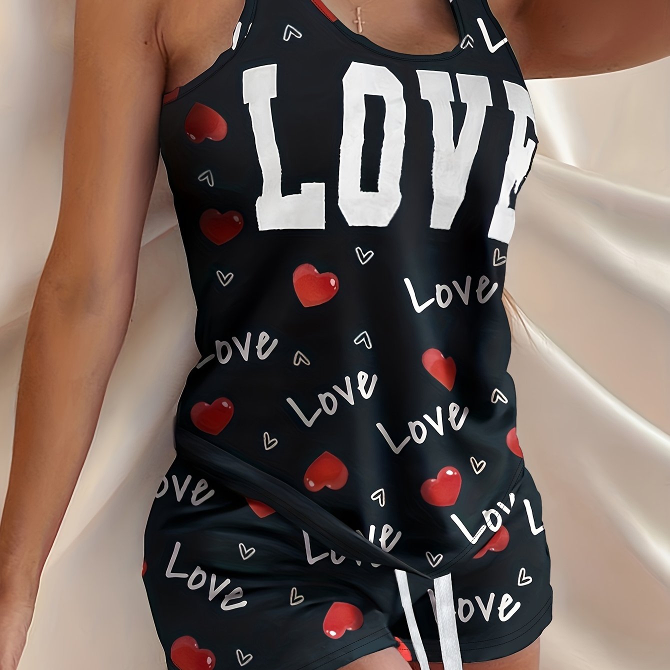 Heart and letter print pajama set including crew neck tank top and drawstring shorts for women's loungewear.