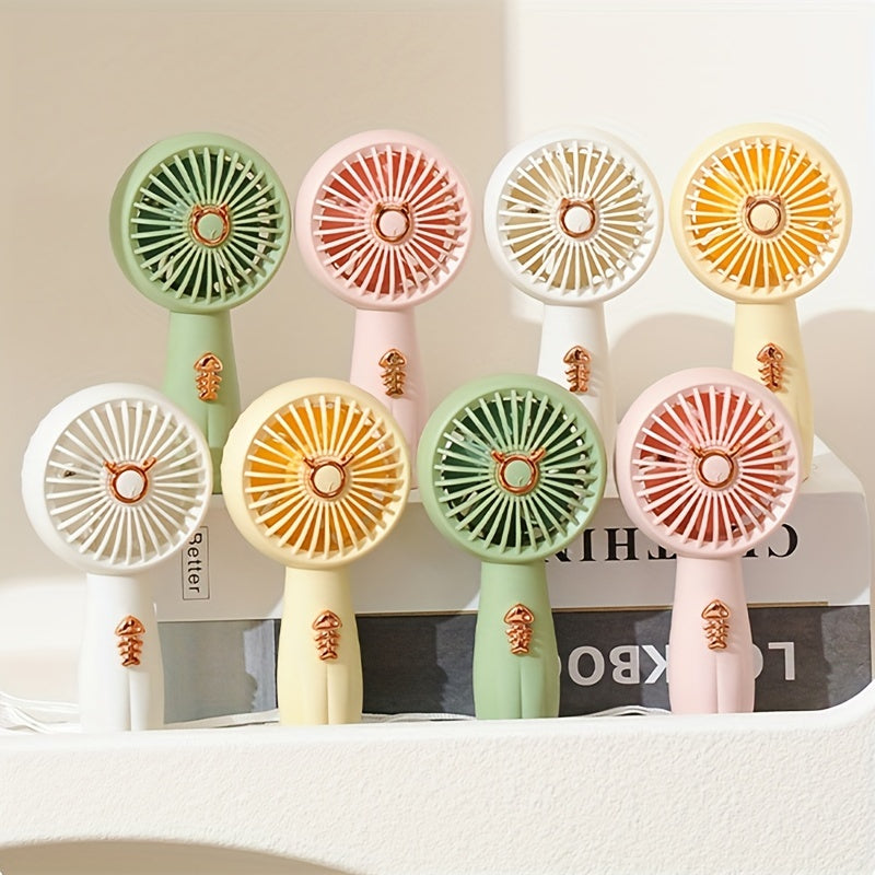 Stay cool this summer with the TOOP Cartoon Mini Handheld Fan! This adorable fan features a built-in light, durable ABS material, and a USB rechargeable 500mAh lithium battery. Perfect for on-the-go or desktop use, this portable fan makes a cute and