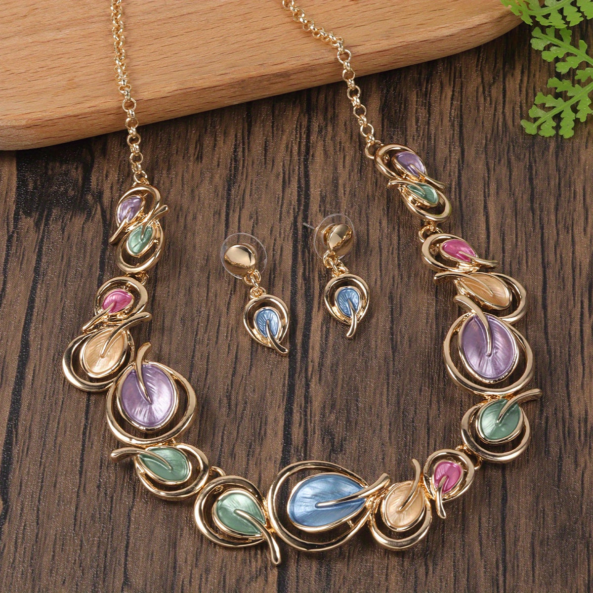 Colorful choker necklace and stud drop earrings set with tree of life leaves pattern for women's daily clothing outfit.