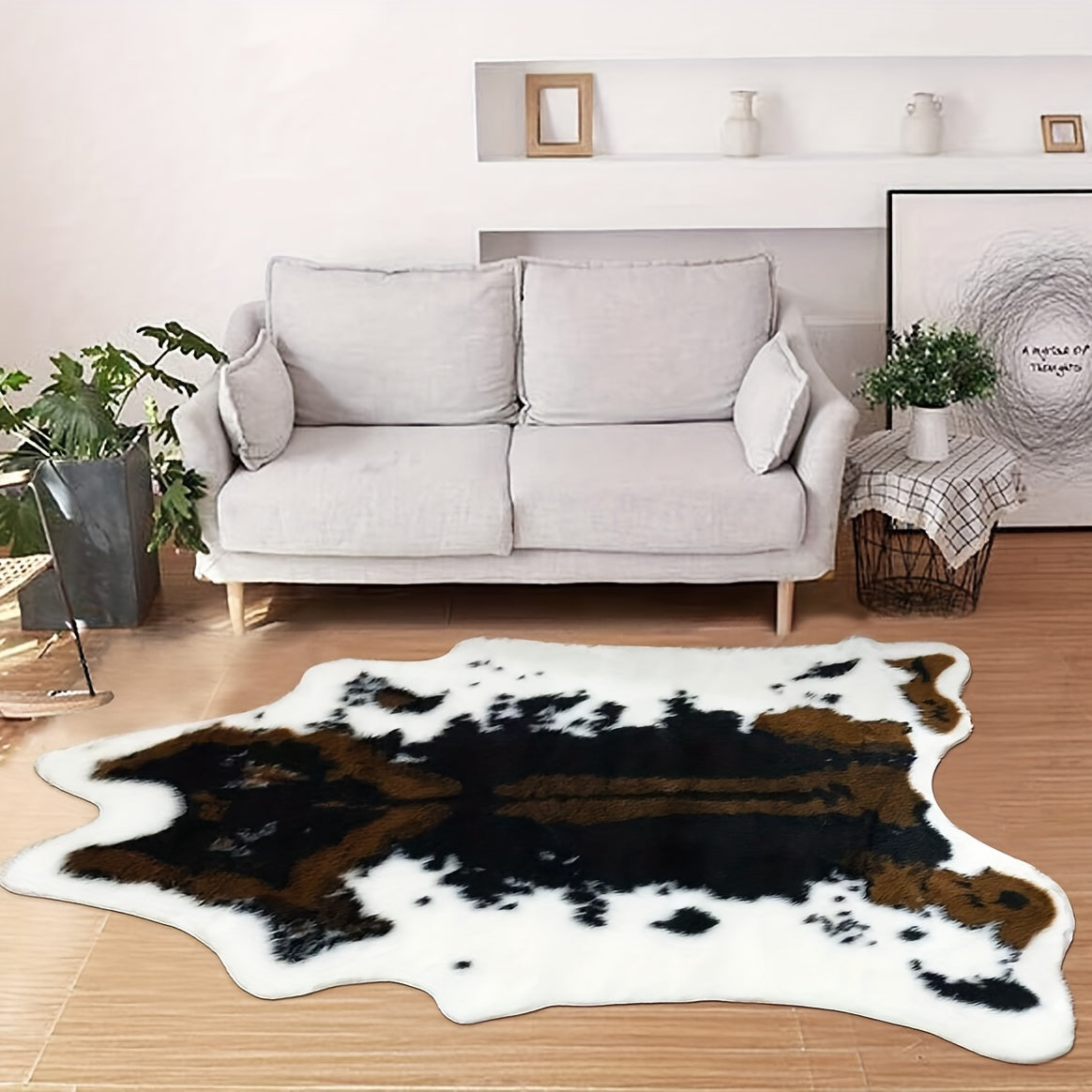 Add a touch of luxury to your space with our 1pc Premium Faux Cowhide Rug. This durable and large size cow print rug is perfect for your bedroom or living room. Made of faux fur, this animal cow hide carpet is easy to maintain with hand washing only.