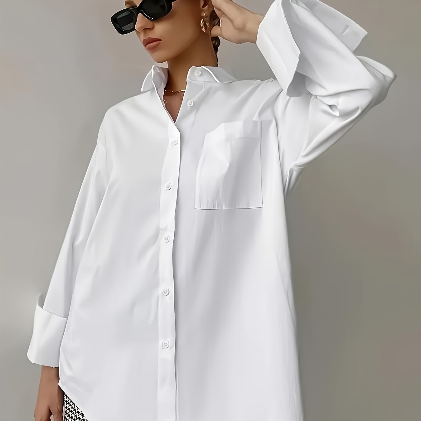 Stylish women's white shirt with pocket, long sleeves, and button-up collar made of non-stretch polyester. Machine washable.