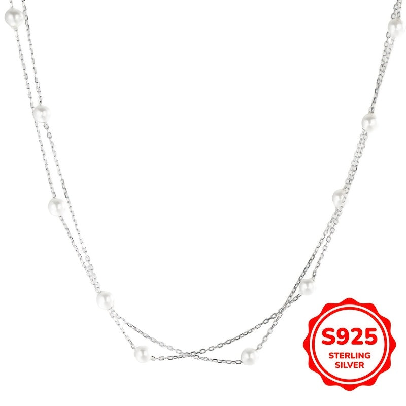 This double-layer pearl necklace is made of 3.02g of S925 sterling silver, giving it a simple and elegant look. The light luxury and high-end design make it perfect for women to wear as a clavicle chain. It is an ideal gift for birthdays, Mother's Day