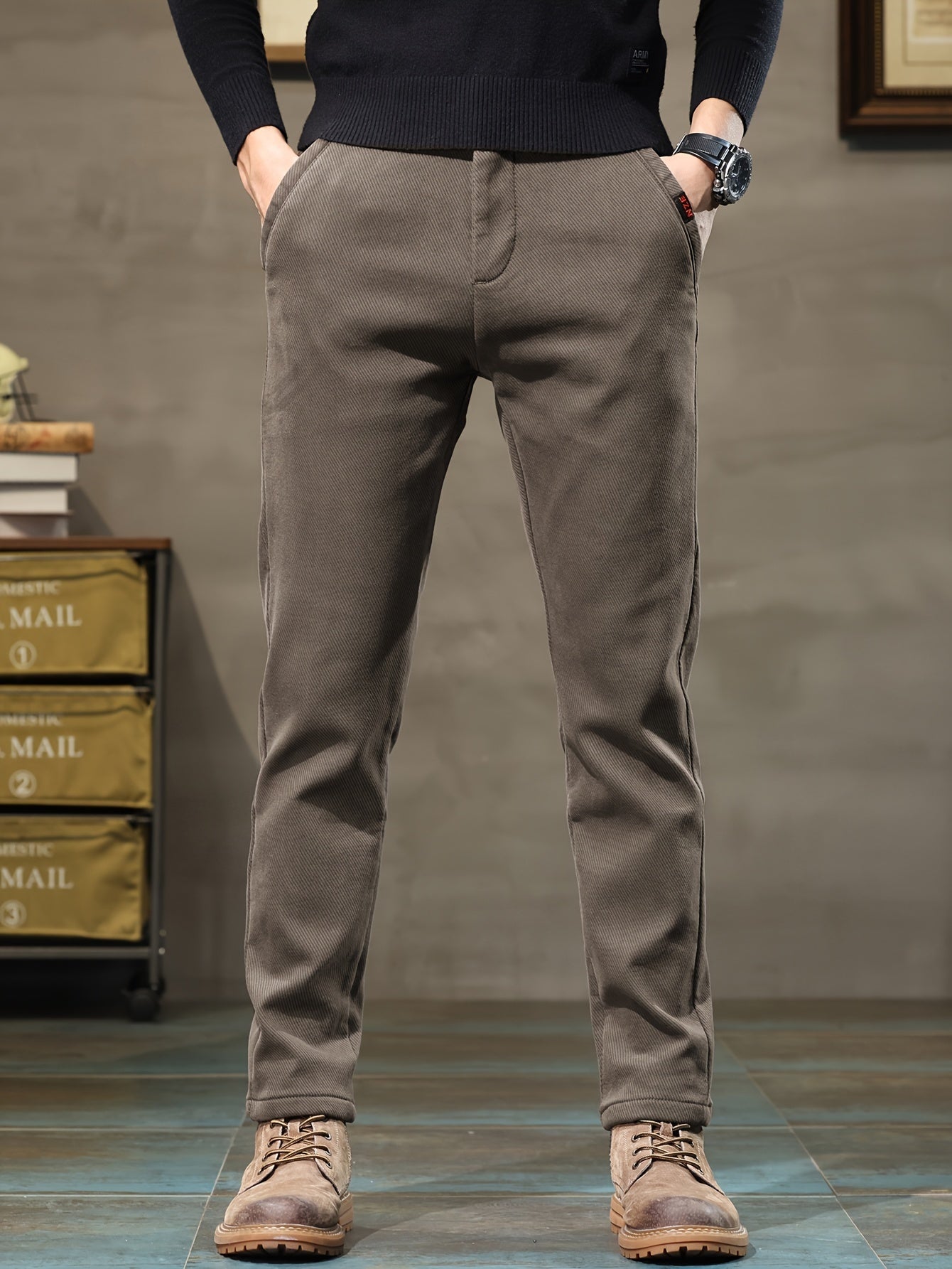 New men's casual pants by a sports brand, perfect for spring and autumn 2023.