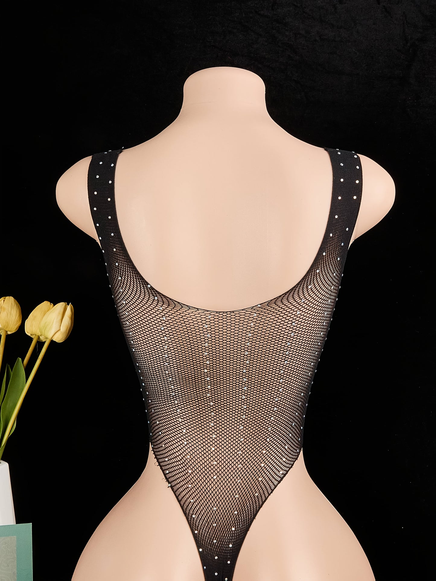 Seductive sheer jumpsuit with lace-up rhinestone detailing for women's backless lingerie.