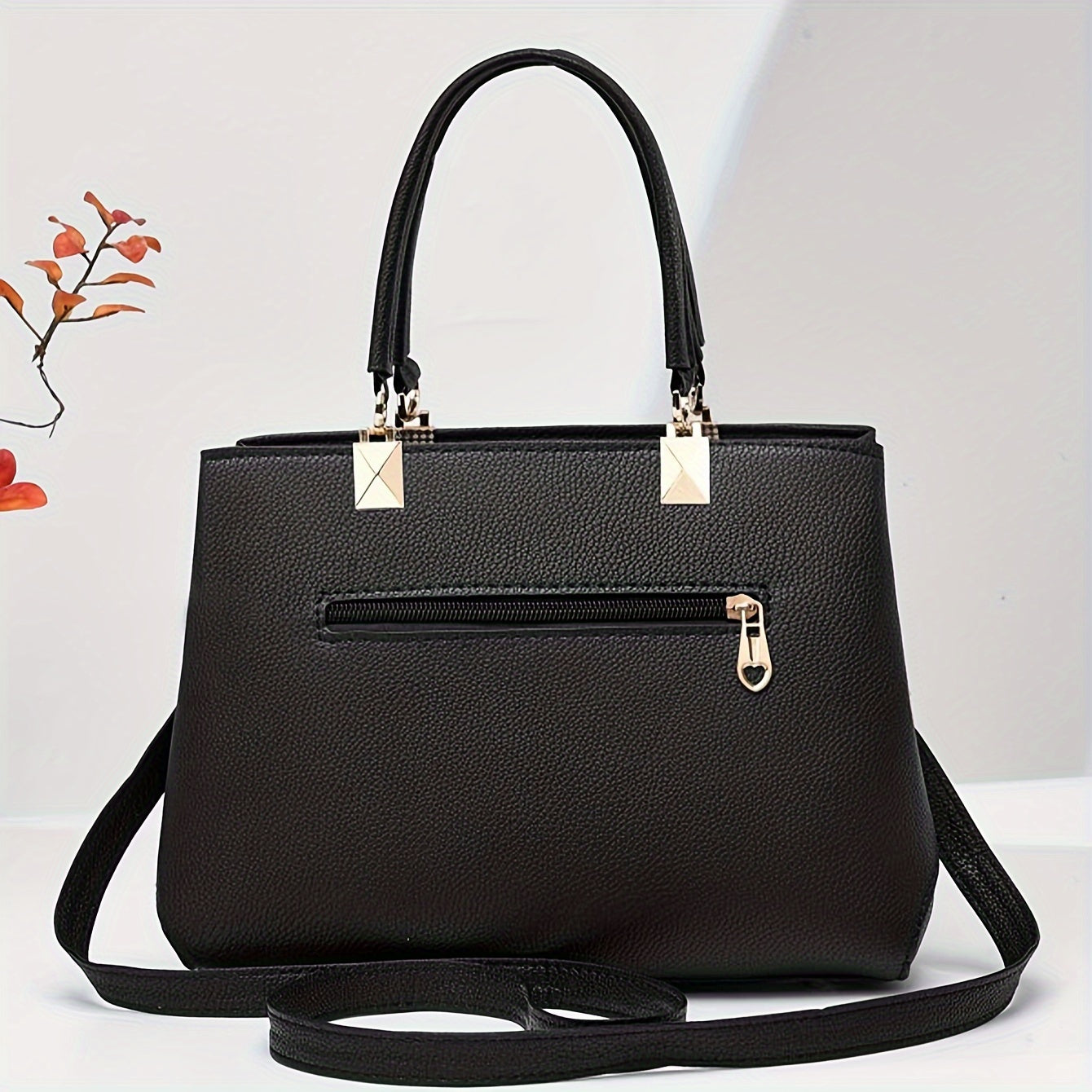 Stylish shoulder bag with bowknot detail and multiple compartments, perfect for work, parties, and everyday use.