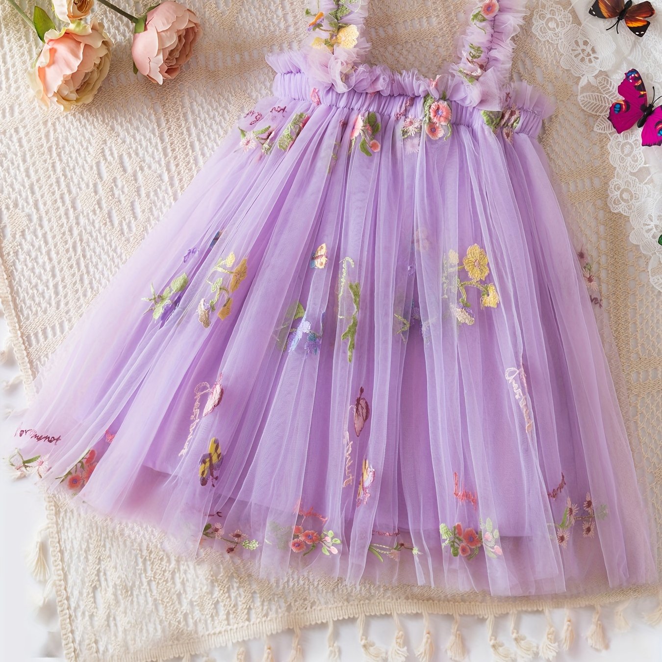 Baby's sleeveless mesh dress with elegant flower embroidery, perfect for summer birthday parties or as a gift.