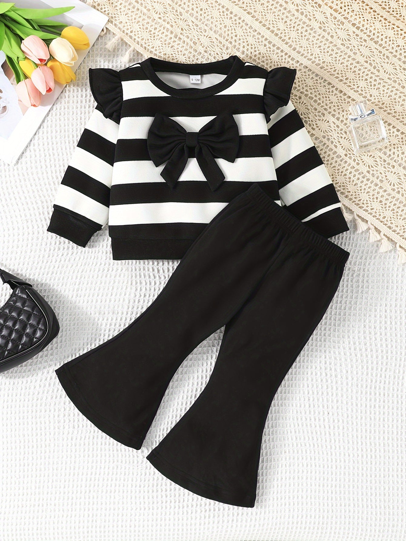 Stylish girls' casual outfit with striped top and matching bell pants, great for outdoor activities in spring and autumn.