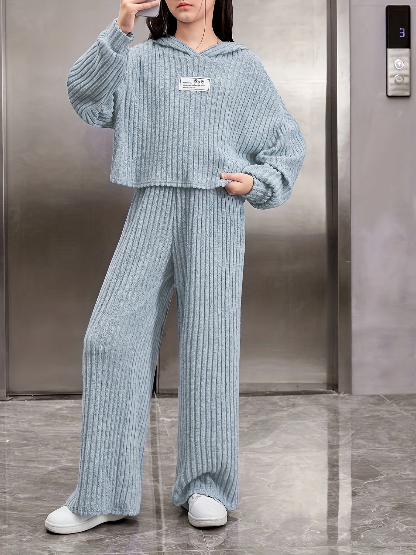 Kids casual knit set with long sleeve hoodie and wide leg pants, ideal for urban outdoor activities in fall and winter.