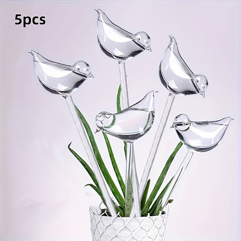 5 bird-shaped self-watering globes for indoor and outdoor plants.